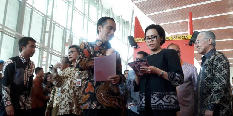 Jokowi, Sri Mulyani, dan Ikat Pinggang