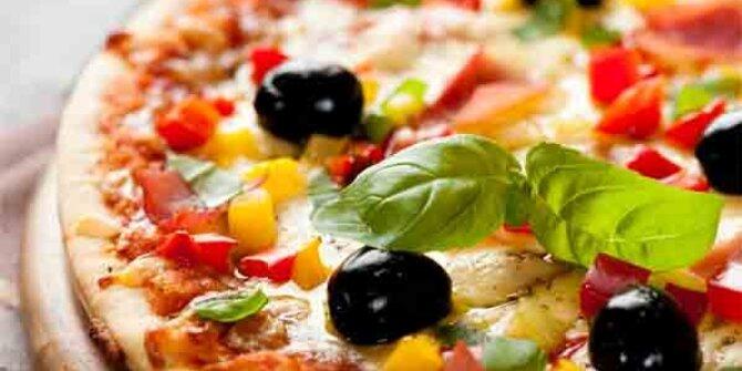5 Bahaya kesehatan yang terkandung dalam sepotong pizza