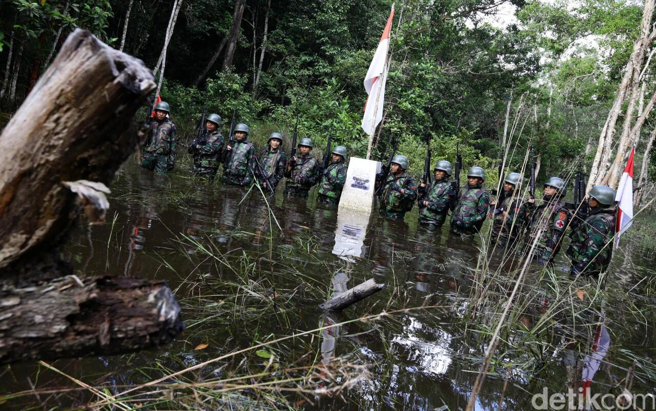 Patroli Bersama Tentara Penjaga Perbatasan RI-PNG di Rawa-rawa Papua