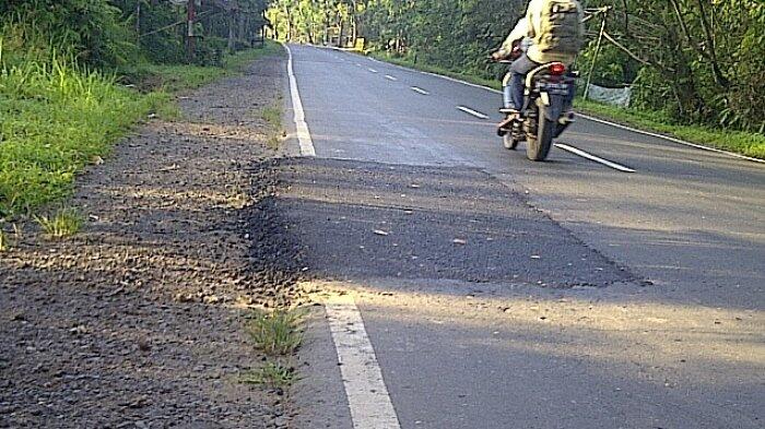 Tambal Sulam Jalan Aspal