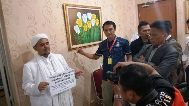 Inkonsistensi Polisi Menangani Kasus HA-HFZ dan Rizieq-Firza
