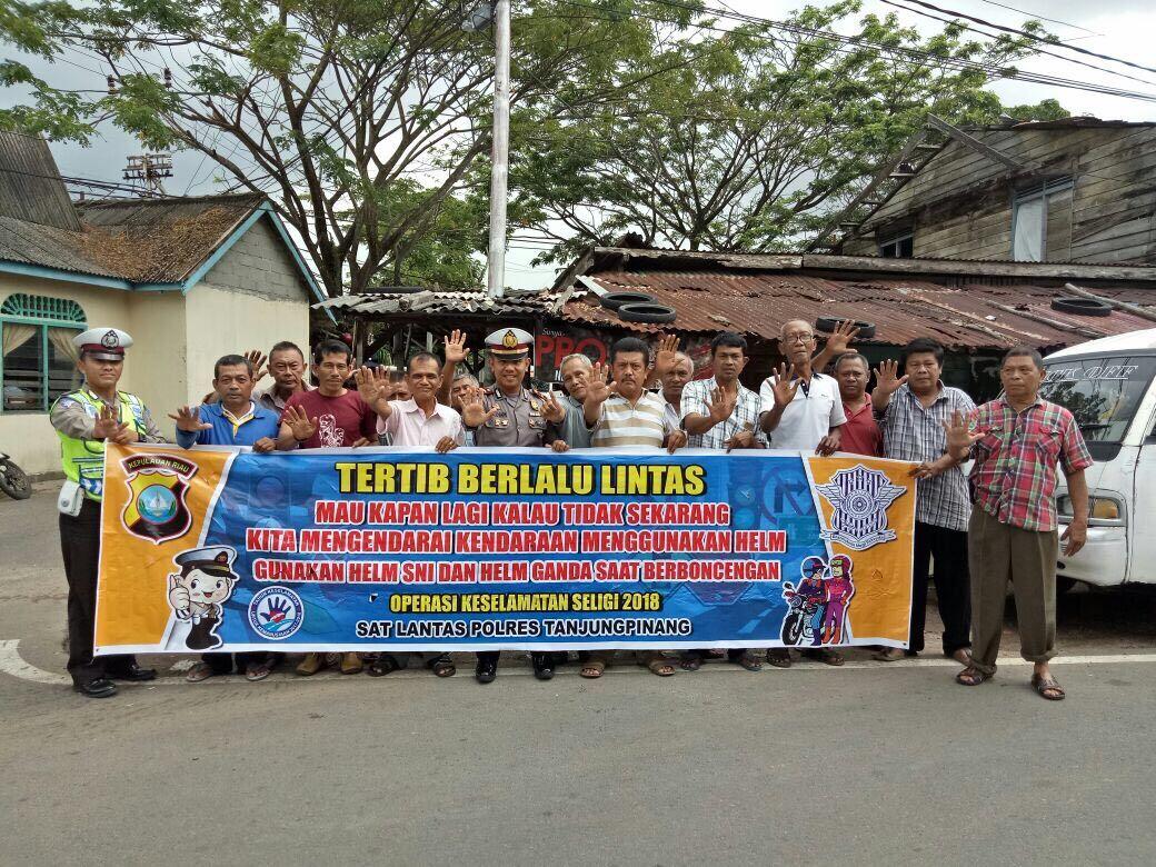 Unit Dikyasa : Minggu Pagi Sosialisasi Tertib Berlalu Lintas Bersama Bapak Bapak Ojek