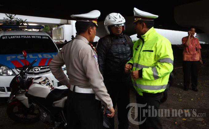Pengemudi Ertiga yang Ludahi Anggota Polantas Minta Maaf dan Minta Dicabut Laporannya
