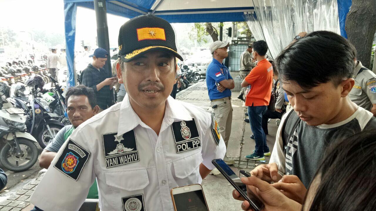 Memakai Kaos #2019GantiPresiden, Pengunjung CFD Diminta Ganti Pakaian