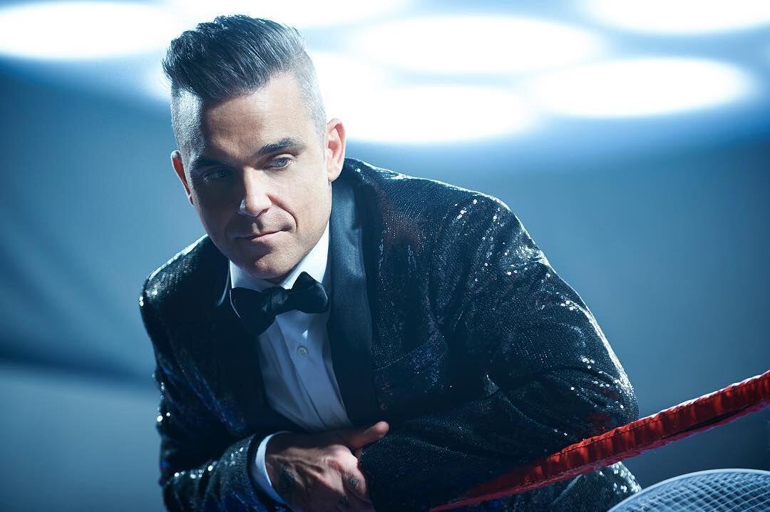 Artis Pembuka Piala Dunia 2018, Ini 10 Potret Karier Robbie Williams