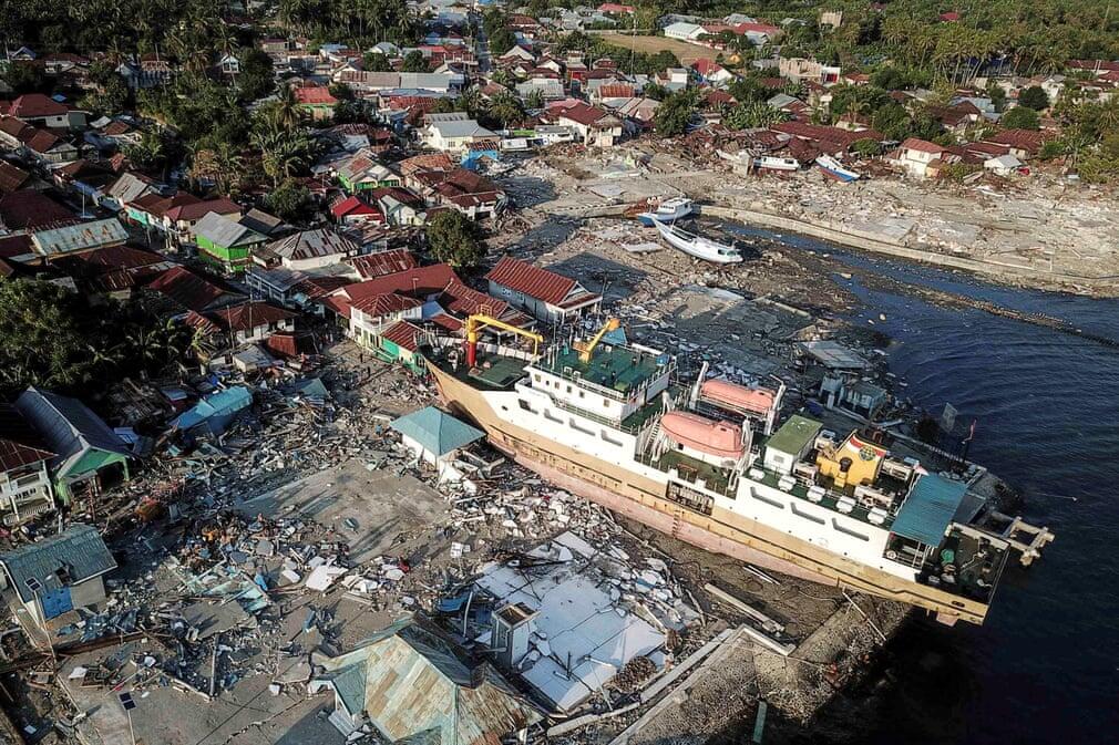 A combination of Aatellite Images Shows Palu, Indonesia (before & after)
