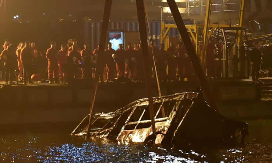 Bus plunges into Chinese river after fight between driver and passenger