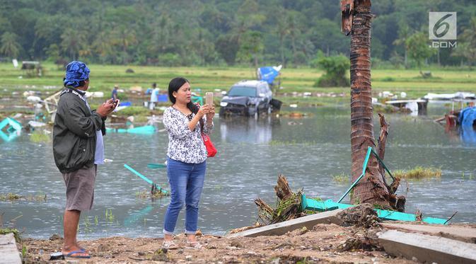 Berselfie di Kawasan Terdampak Langsung Tsunami