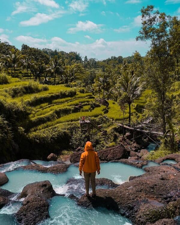 9 Potret Indahnya Air Terjun Kedung Kandang, Asri di Persawahan Yogya