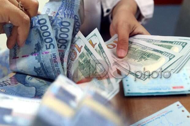 Rupiah Berakhir Kokoh di Level Rp14.385/USD, Dolar Tergelincir