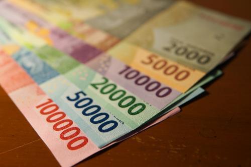 Rupiah Melemah Tipis ke Rp14.130 per USD