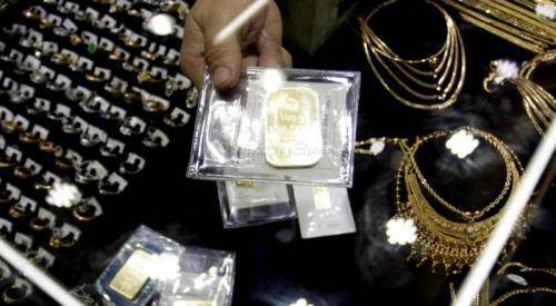Harga Emas Antam Kembali Turun ke Rp699.000/Gram