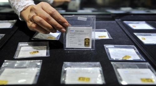 Harga Emas Antam Bertahan di Rp699.000/Gram