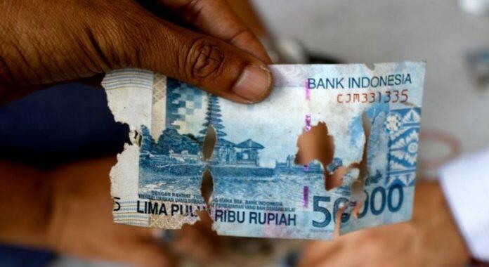 Seberapa Besar Persentase Kerusakan Uang yang Bisa Diganti oleh Bank?