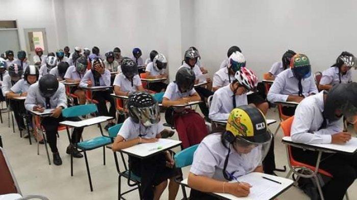 Viral, Mahasiswa Thailand Pakai Helm Saat Ujian!
