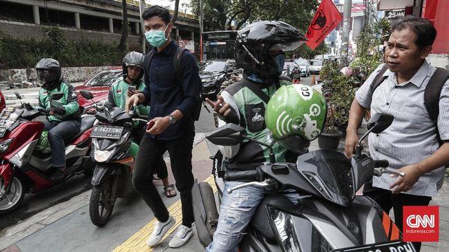 Tips Nyaman Naik Ojek Daring 