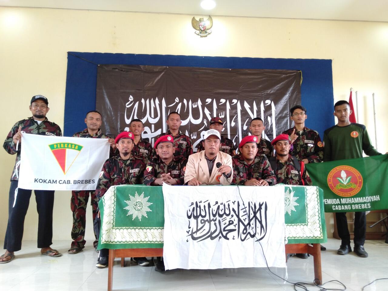 Radikalisme Penggiringan Anak PKI. Foto Kokam Muhammadiyah Berbendera HTI