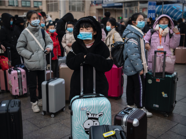 10 Foto Mudik Imlek di Tiongkok di Tengah Penyebaran Virus Corona