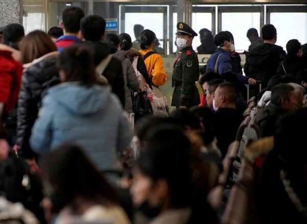 10 Foto Mudik Imlek di Tiongkok di Tengah Penyebaran Virus Corona