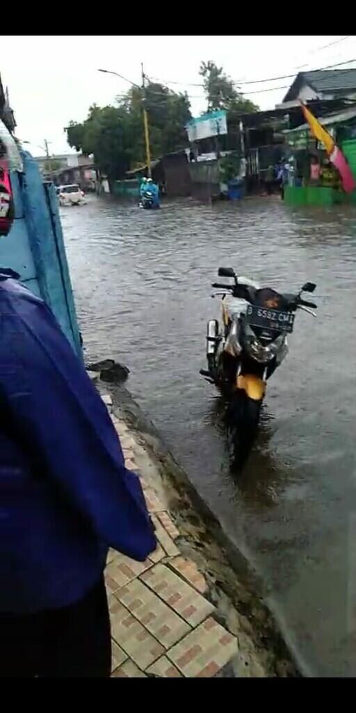 Hujan di Tangerang mengakibatkan Buruh Libur kerja