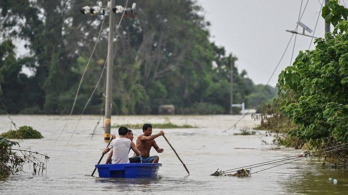 Banjir Kepung 24 Provinsi di China, Ini Dia Foto-Fotonya