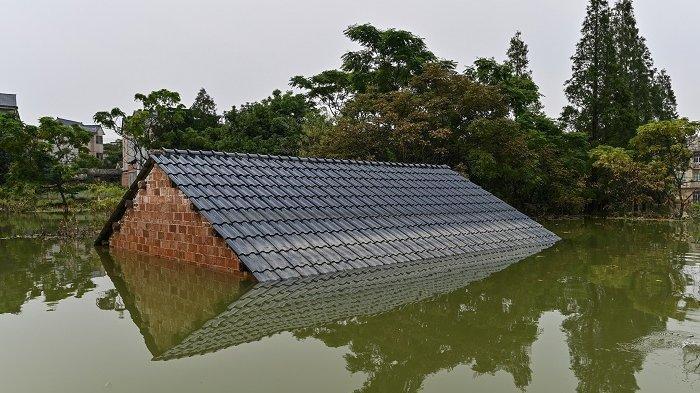 Banjir Kepung 24 Provinsi di China, Ini Dia Foto-Fotonya