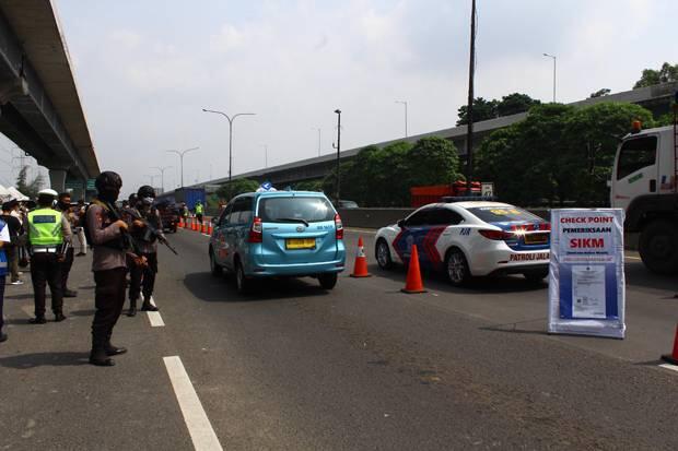 Adang Pemudik Keluar Jadetabek, 1.313 Aparat Berjaga di 31 Titik Pospam selama 24 Jam