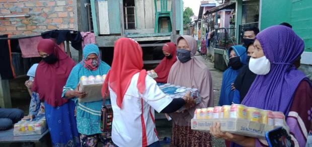 Jelang Lebaran, Perindo Jambi Bagikan Ratusan Minuman Kaleng ke Warga Prasejahtera