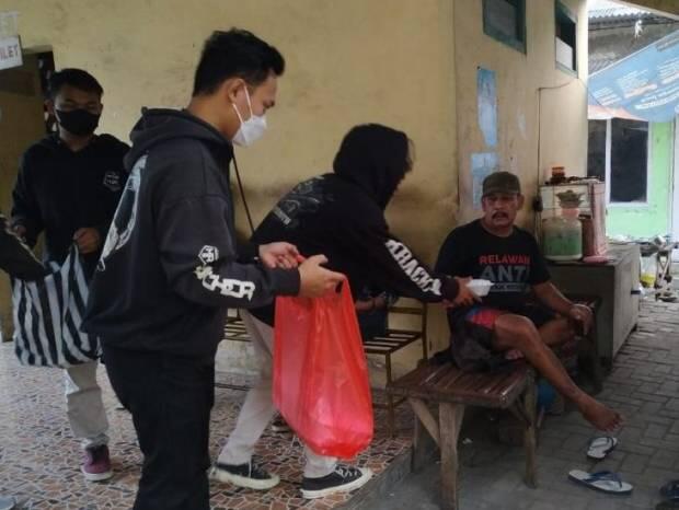 Semangat Berbagi di Bulan Suci Komunitas Motor CCI Madiun dan Kracker Romawi