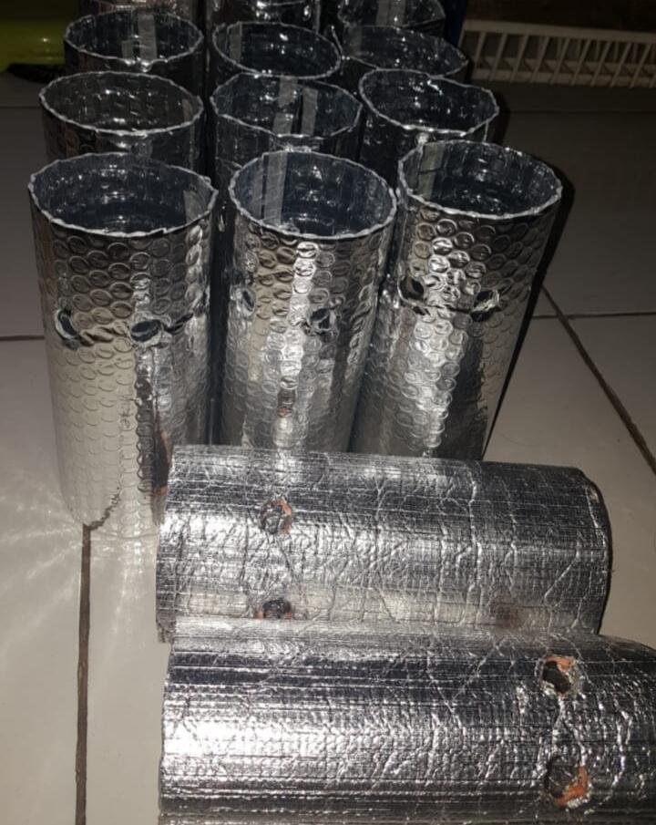 Mengubah Botol Bekas Air Mineral Menjadi Pot Media Tanam Ciamik