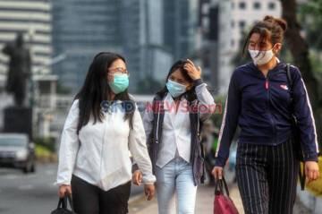 DKI Imbau Warga Pakai Dua Lapis Masker, Warganet: Satu Aja Engap