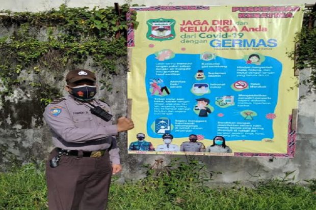 Aipda Untung Nainggolan Peduli Jaga Warga dari Penyebaran COVID-19