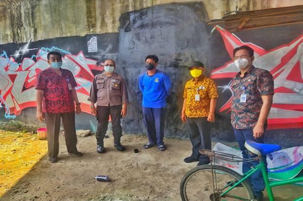 Polisi Cari Pembuat Mural Mirip Wajah Jokowi di Tangerang