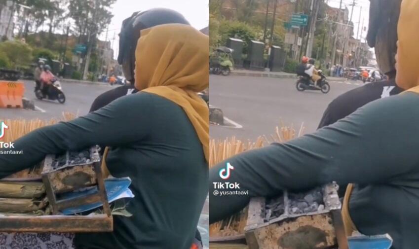 Ibu Penjual Sate Ini Tahan Panas