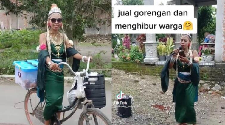 Penjual Gorengan Ini Berbusana Serba Hijau dengan Mahkota