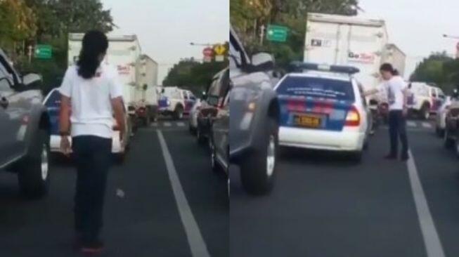 Nyampah di Jalan, Pria Ini Masukkan Kembali Sampah ke Mobil Polisi