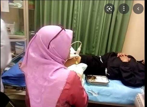 sedot cairan lutut