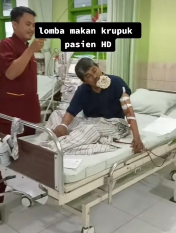 Sambil Cuci Darah, Pasien Rumah Sakit Tetap Ikut Lomba Makan Kerupuk di Atas Kasur