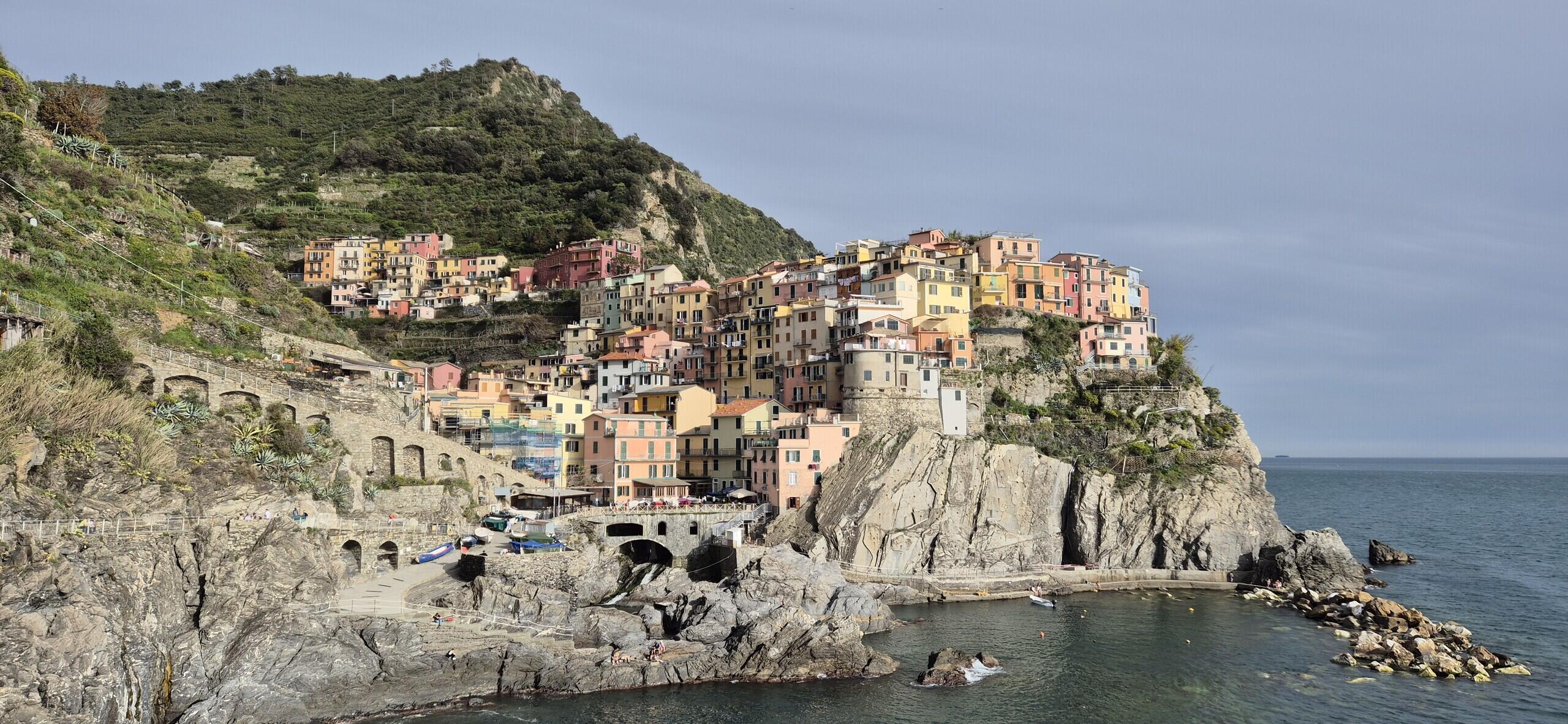 Describe Cinque Terre Italy Beautiful Coastline Village with UNESCO Heritage