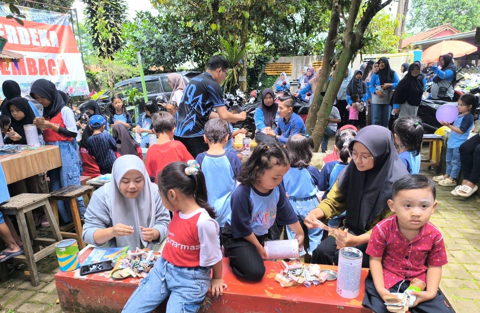 Hari Buka Celengan Taman Bacaan, Ajak Anak-anak Menabung Sejak Dini