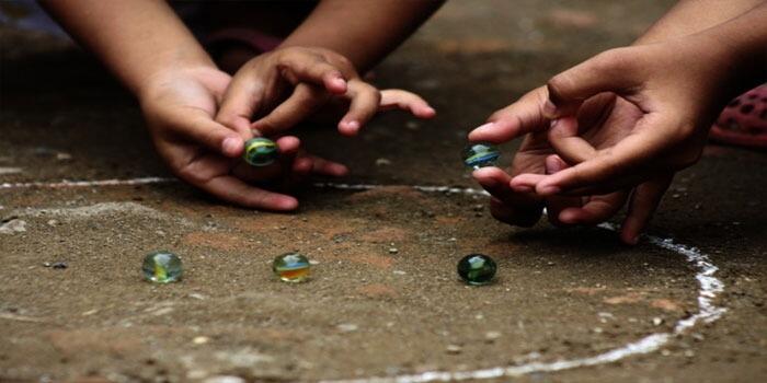 Permainan Kelereng/Gundu: Warisan Budaya yang Tak Lekang oleh Waktu