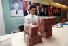 Rupiah Siang Ini Tertekan 21 Poin ke Rp14.229/USD