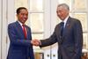 BI Teken Kerjasama dengan MAS untuk Pertukaran Mata Uang