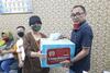 Cegah Covid-19, Pemprov DKI Salurkan Ribuan Obat Herbal untuk Kuli Beras di Cipinang