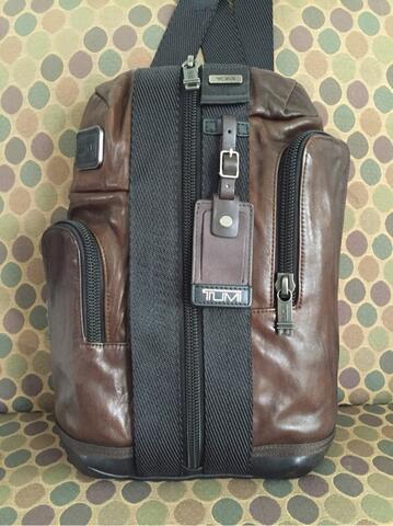 tumi leather sling bag