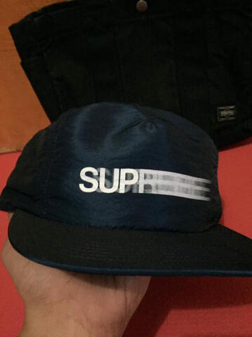 supreme motion hat