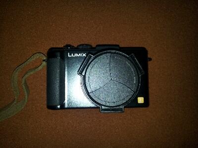 Auto Lenscap Panasonic Lumix LX-7 black n limited edition. very useful!!