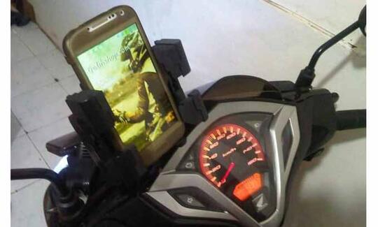 Polri Mulai Berlakukan Denda Rp 500 Ribu Atau Penjara Pemakai Braket Handphone
